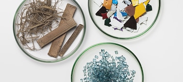 Three plates containing a selection of sustainable materials