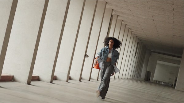 "Clipped example image of a woman moving, taken from footage shot in 4K60P mode"